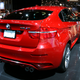 Illustration for article titled BMW X6 M: Popping The Top On The Mighty 555 HP Engine